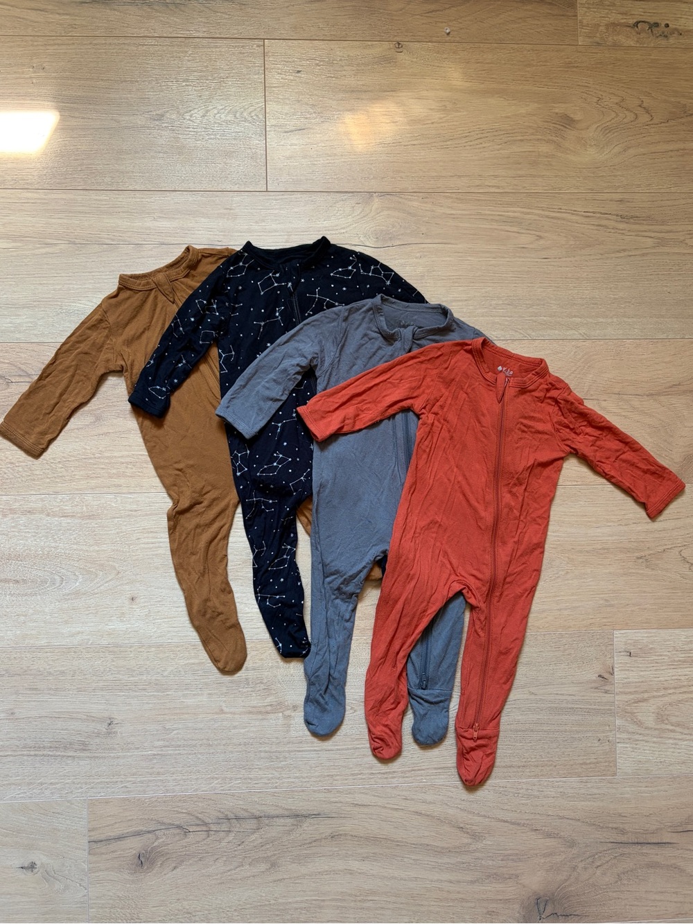 Set of 4 Kyte baby zippered footie sleepers